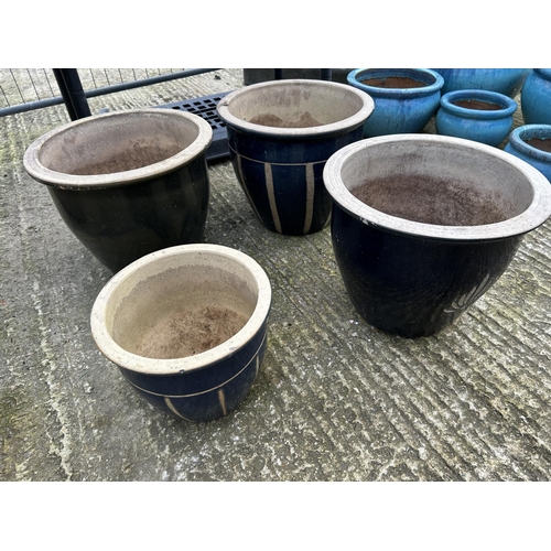 312 - Four assorted glazed garden pots