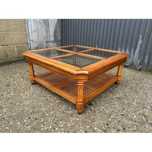 4 - A square cherrywood coffee table with four glass panels 90x90 x40