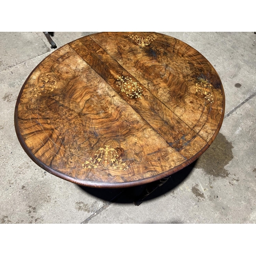 45 - A Victorian walnut inlaid Sutherland table