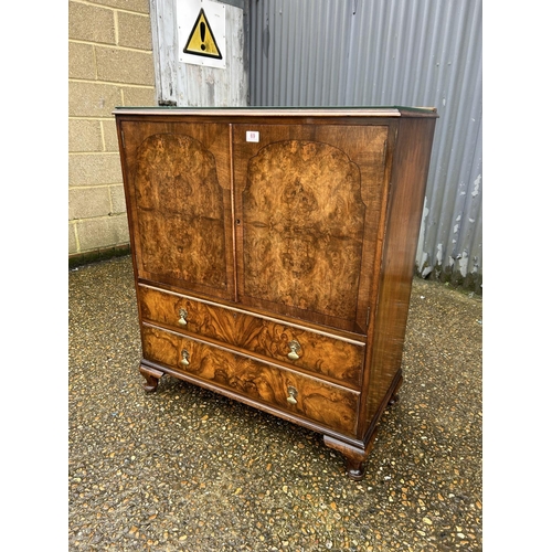 69 - A burr walnut 1930's tallboy cupboard