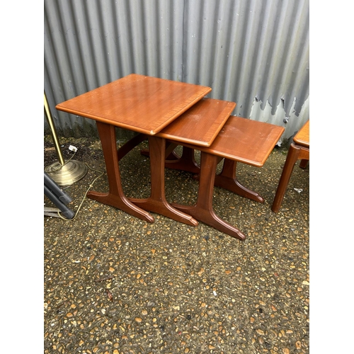 81 - A teak nest of three, small coffee table and a occasional table