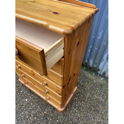 87 - A pine tallboy chest of six