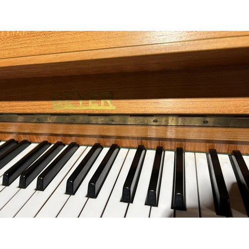 9 - A danish made teak cased upright piano by GEYER