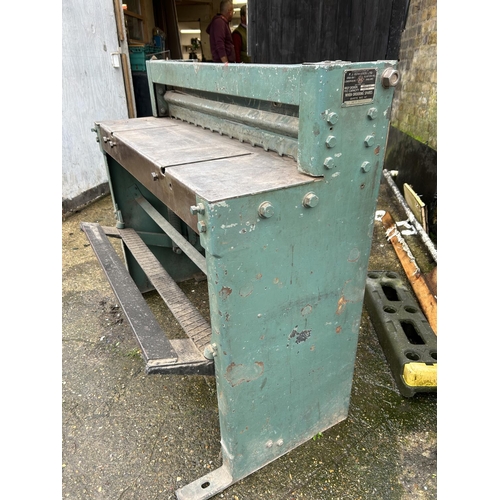 412 - A heavy duty sheet metal guillotine by F J EDWARDS; 114cm Total width, floor standing