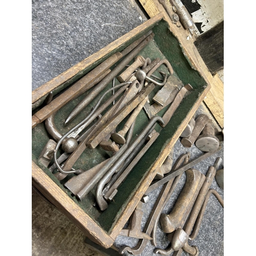 449 - A wooden tray of assorted Silversmiths shapers, bars, etc