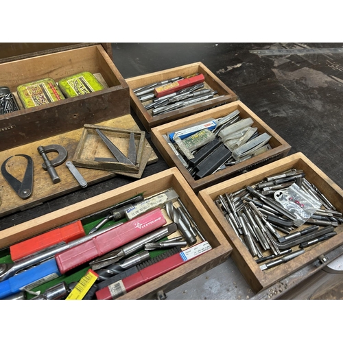 450 - A Engineers workshop cabinet with contents including various engineering bits, cutters etc