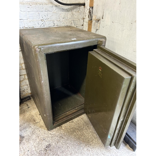 465 - A large green commercial size safe 66x 66x90 cms, with key  - TO BE COLLECTED BY PURCHASER DIRECT FR... 