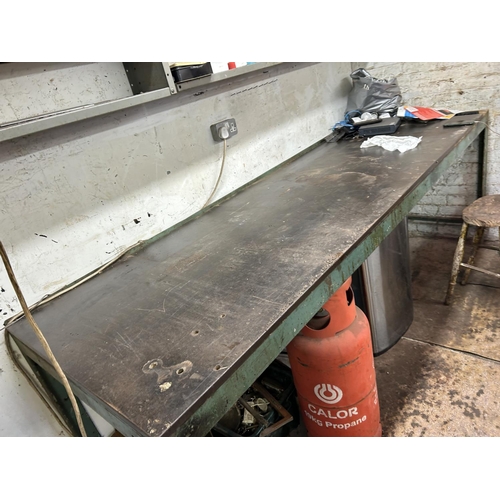 467 - A very large steel  workshop table, heavy steel frame with steel sheet top and wooden board top  260... 