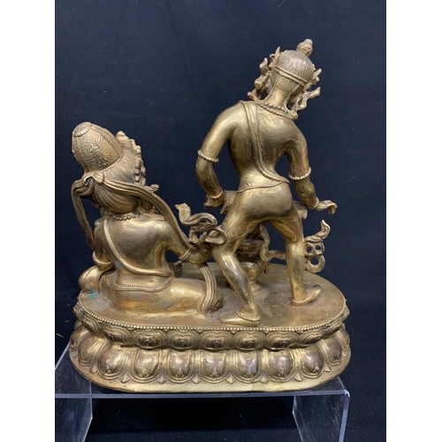 620 - Gilt and Jewelled Oriental group figure, length 27cms, height 28cms