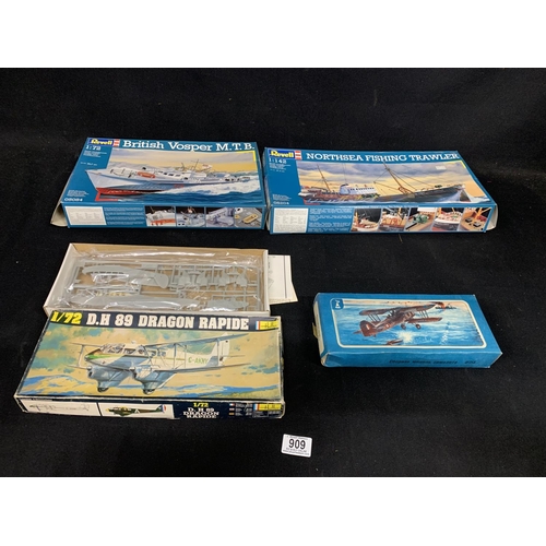 909 - Two Revell Model boat kits and two other model plane kits