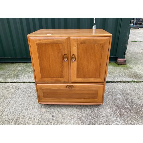 270 - A mid century Ercol light elm media cabinet