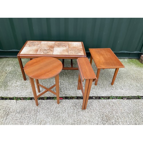 281 - A teak tile top coffee table, small table and two small circular tables