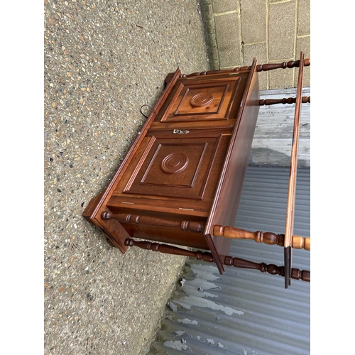 283 - A modern cherrywood? Open bookshelf with cupboard 125 x 34. X 100