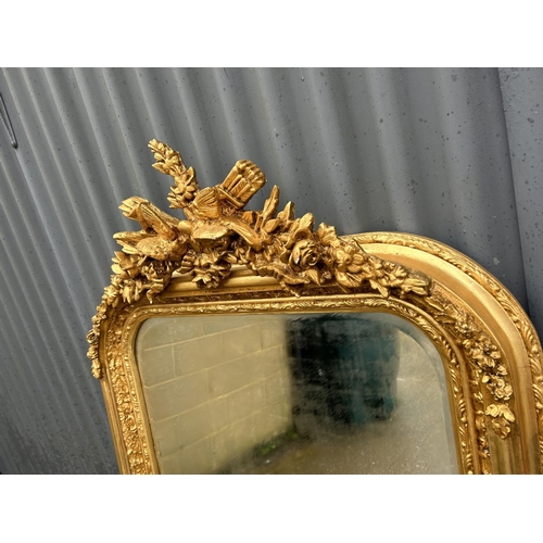 285 - A highly ornate gold gilt framed wall mirror with love birds decoration 80x 161