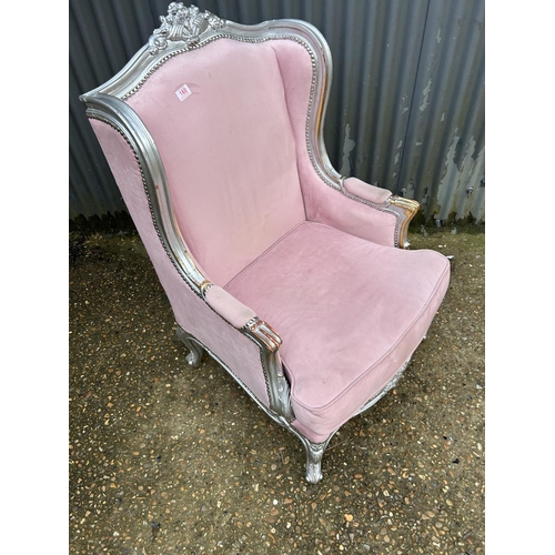 286 - A silver gilt framed armchair with pink upholstery