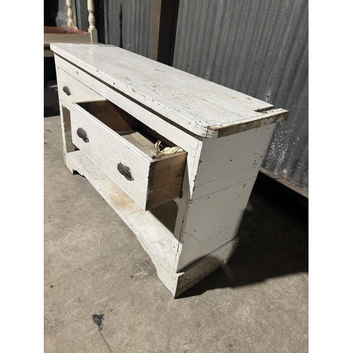 12 - A white painted two drawer dresser base 145x47x90 cms