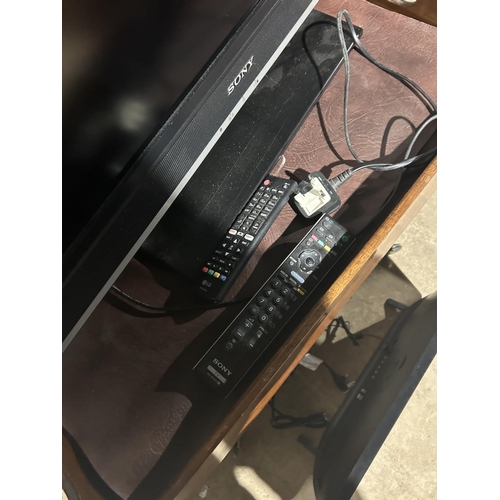 14 - Sony TV & small LG TV both with remotes