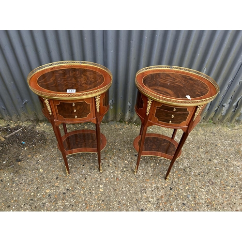 141 - A pair of Italian style three drawer bedsides with brass gallery top