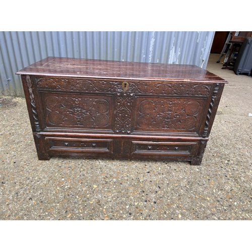 146 - An early oak two drawer mule chest 128x58x66