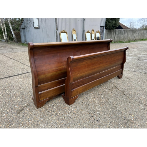 166 - A large modern hardwood sleigh bed frame 6ft (super king)