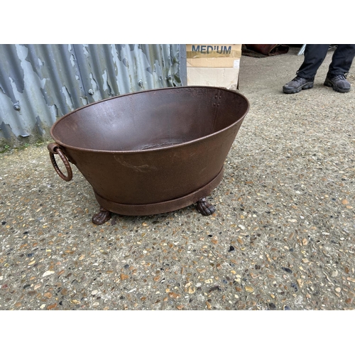 173 - A large rustic iron Cauldron 74x59