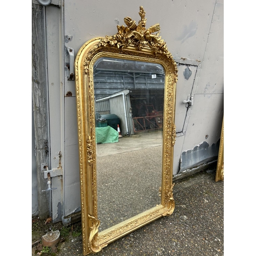 179 - A large ornate gold gilt wall mirror 85x 160