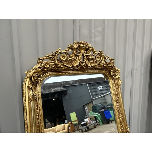 181 - A large ornate gold gilt wall mirror 85x 160