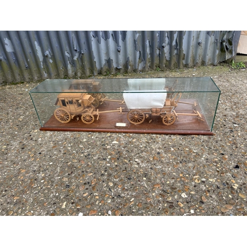 187 - Model of wagon under glass case