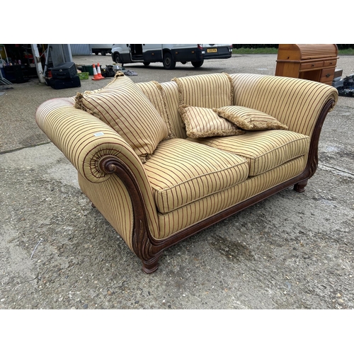 190 - A gold stripe pattern sofa