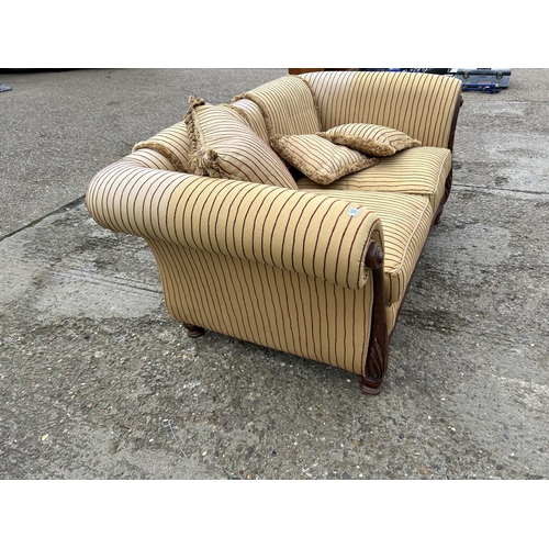 190 - A gold stripe pattern sofa