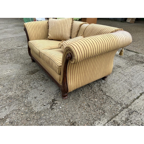 190 - A gold stripe pattern sofa