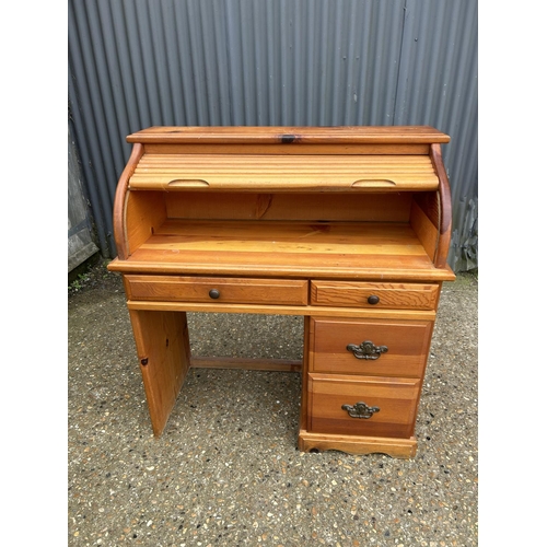 191 - A modern pine roll top desk