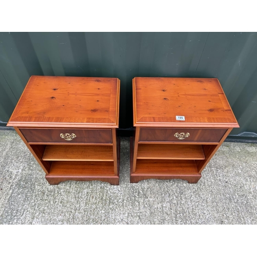 199 - A pair of repro yew wood single drawer bedsides