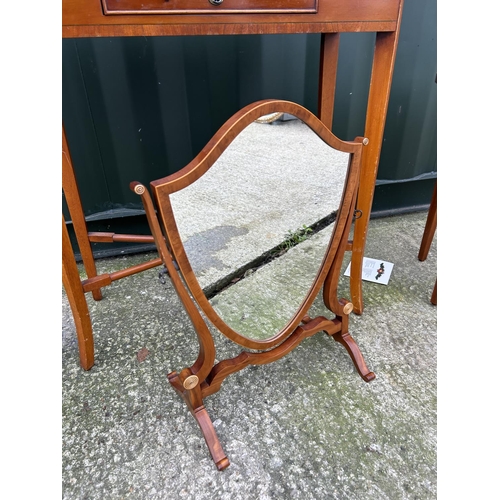 200 - A yew wood hall table together with a yew oval occasional table and a swing mirror