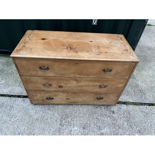 220 - A large pine chest of three drawers 124x66x84