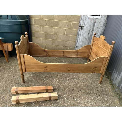 23 - A french style pine single sleigh bed, boltless fixing with all slats