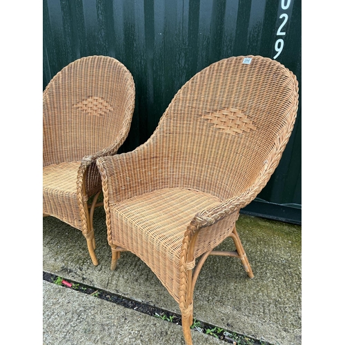 244 - Three wicker conservatory chairs