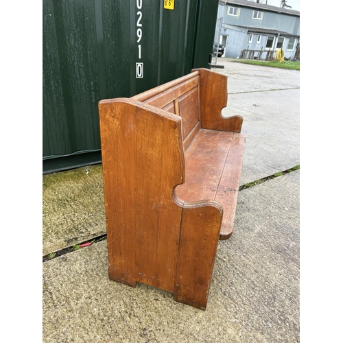 248 - An oak pew bench seat 148cm wide