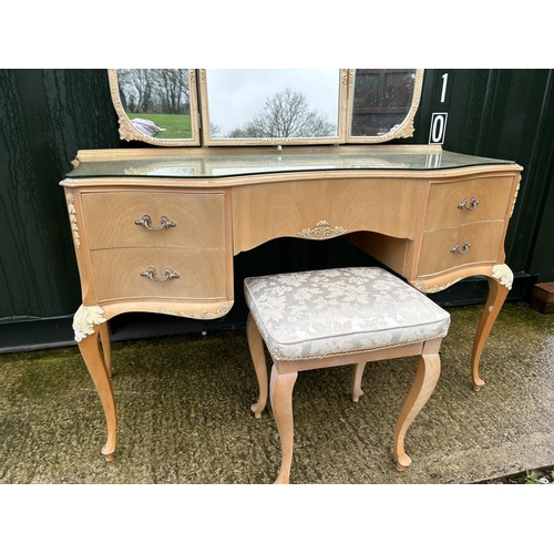 251 - A French style kneehole dressing table with five drawers