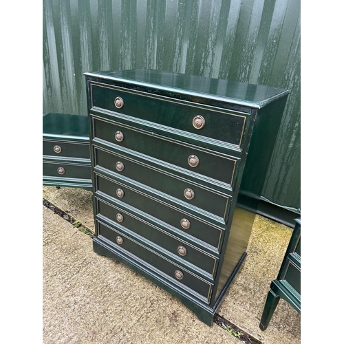 256 - A green painted chest of six drawers together with a pair of two drawer bedsides