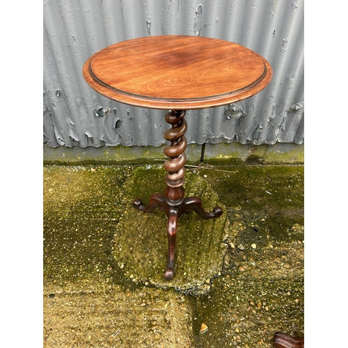 261 - A Sutherland table and a circular mahogany occasional table with twist stem