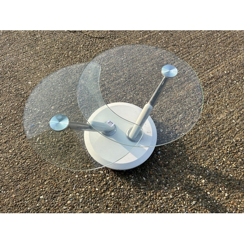 277 - A retro swivel to expand circular glass coffee table