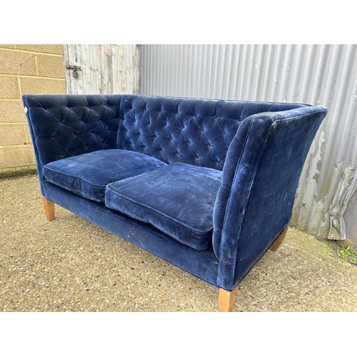 31 - A 'SOFA.com' Blue chesterfield button back sofa 167cm wide