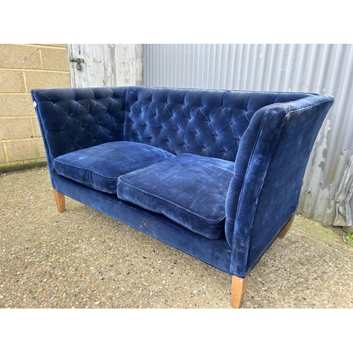 31 - A 'SOFA.com' Blue chesterfield button back sofa 167cm wide