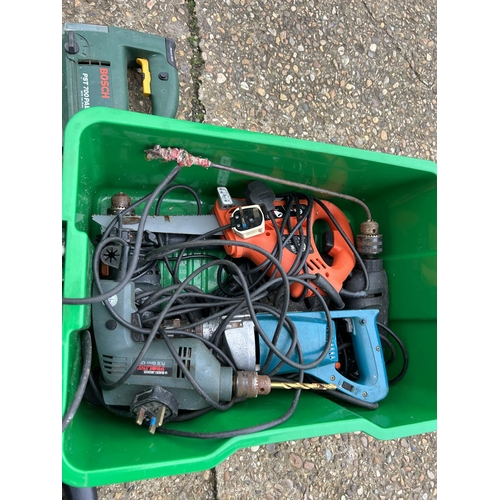 327 - A green tub of power tool