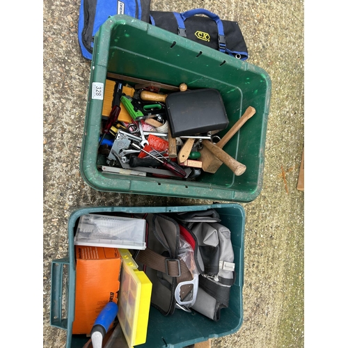 328 - Two green tubs of assorted tools together with a box containing striped and ratchet puller