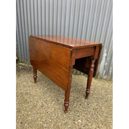 36 - A mahogany drop leaf table