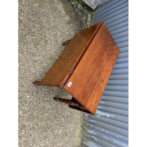 36 - A mahogany drop leaf table