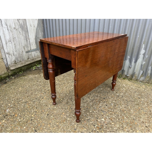 36 - A mahogany drop leaf table