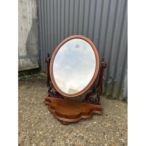 40 - A Victorian mahogany swing mirror